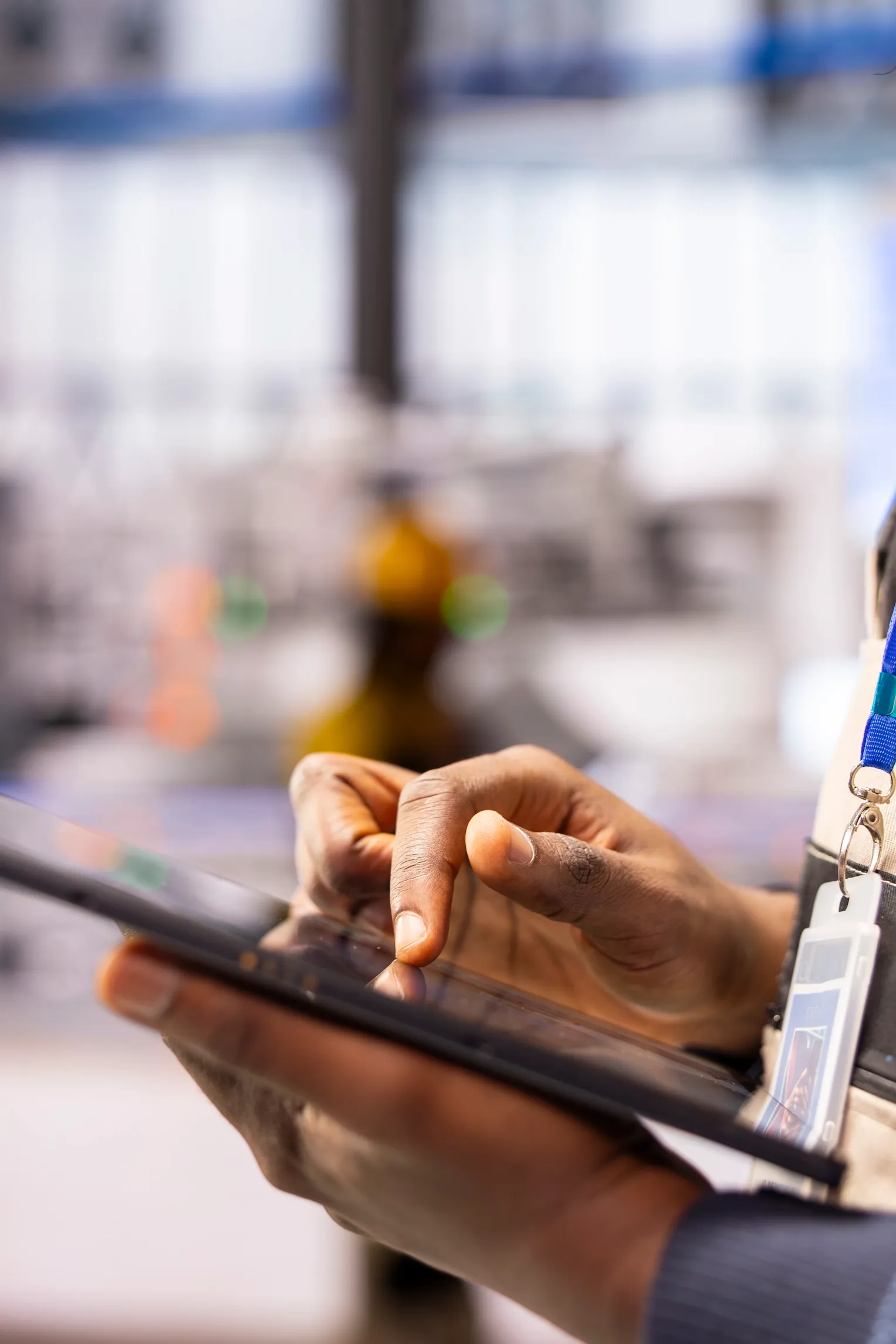 Factory team member using a tablet for a digital production workflow